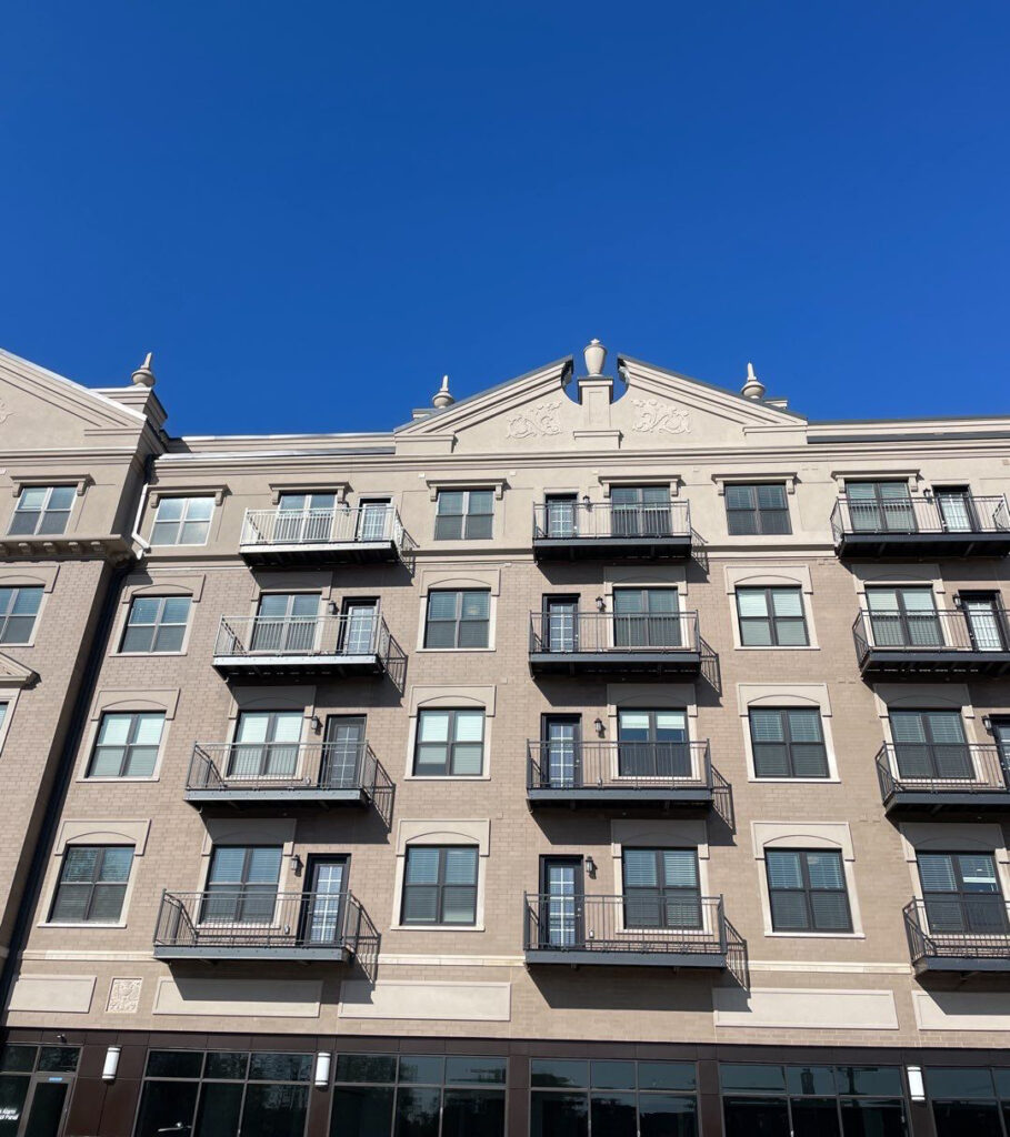 Commercial roof replacement at Holland Playfair apartment building