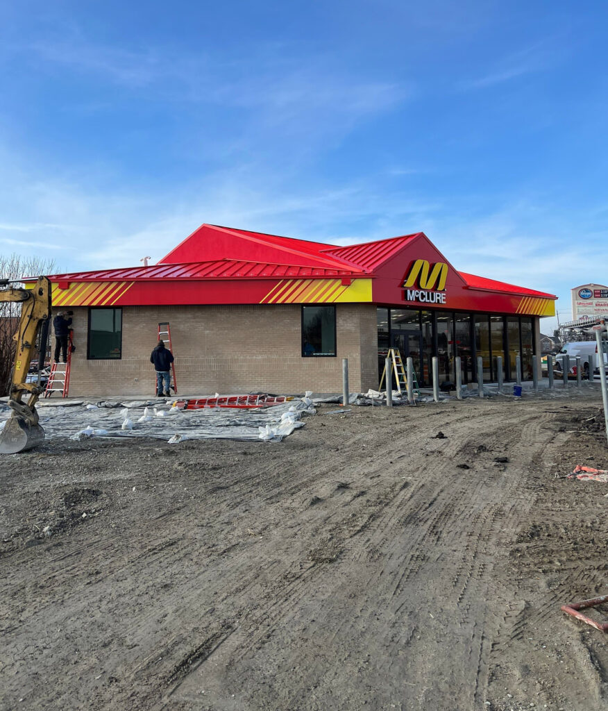 Commercial flat roof installation at McClure Oil facility by Skyline Roofing